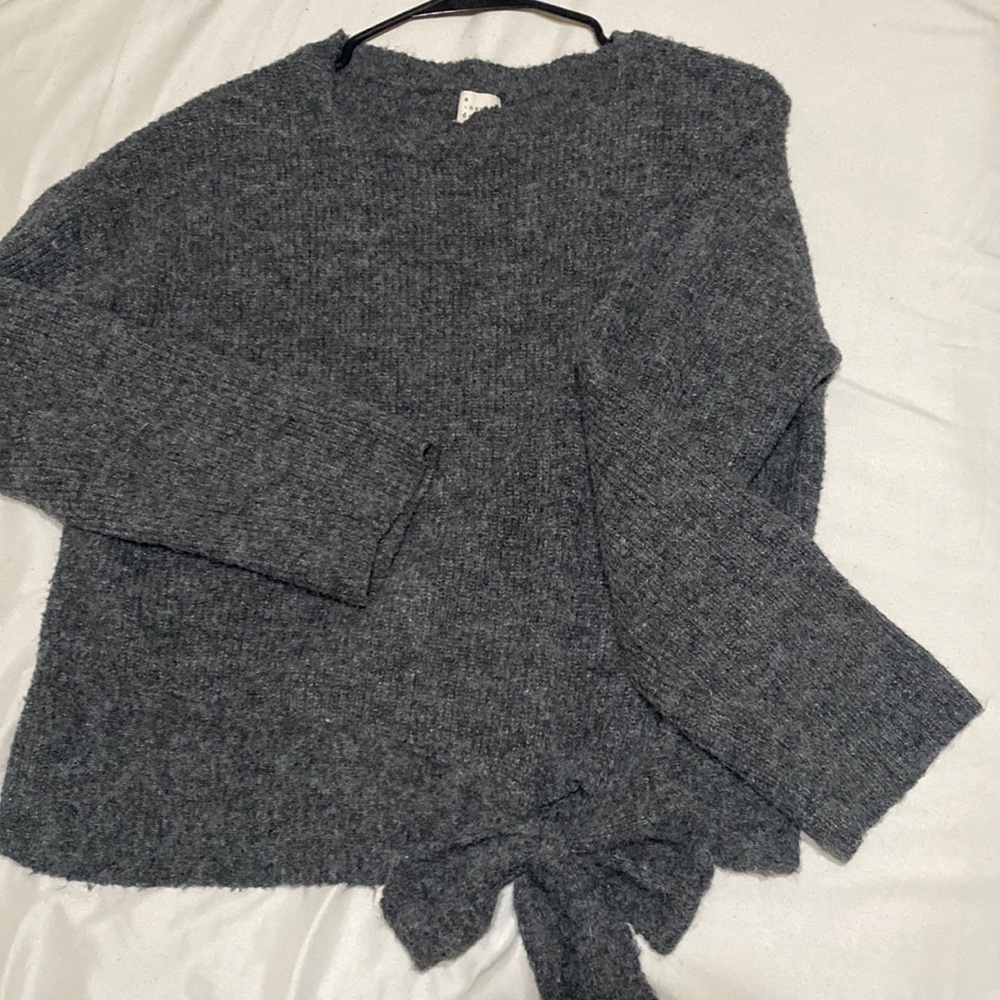 Grey knitted sweater